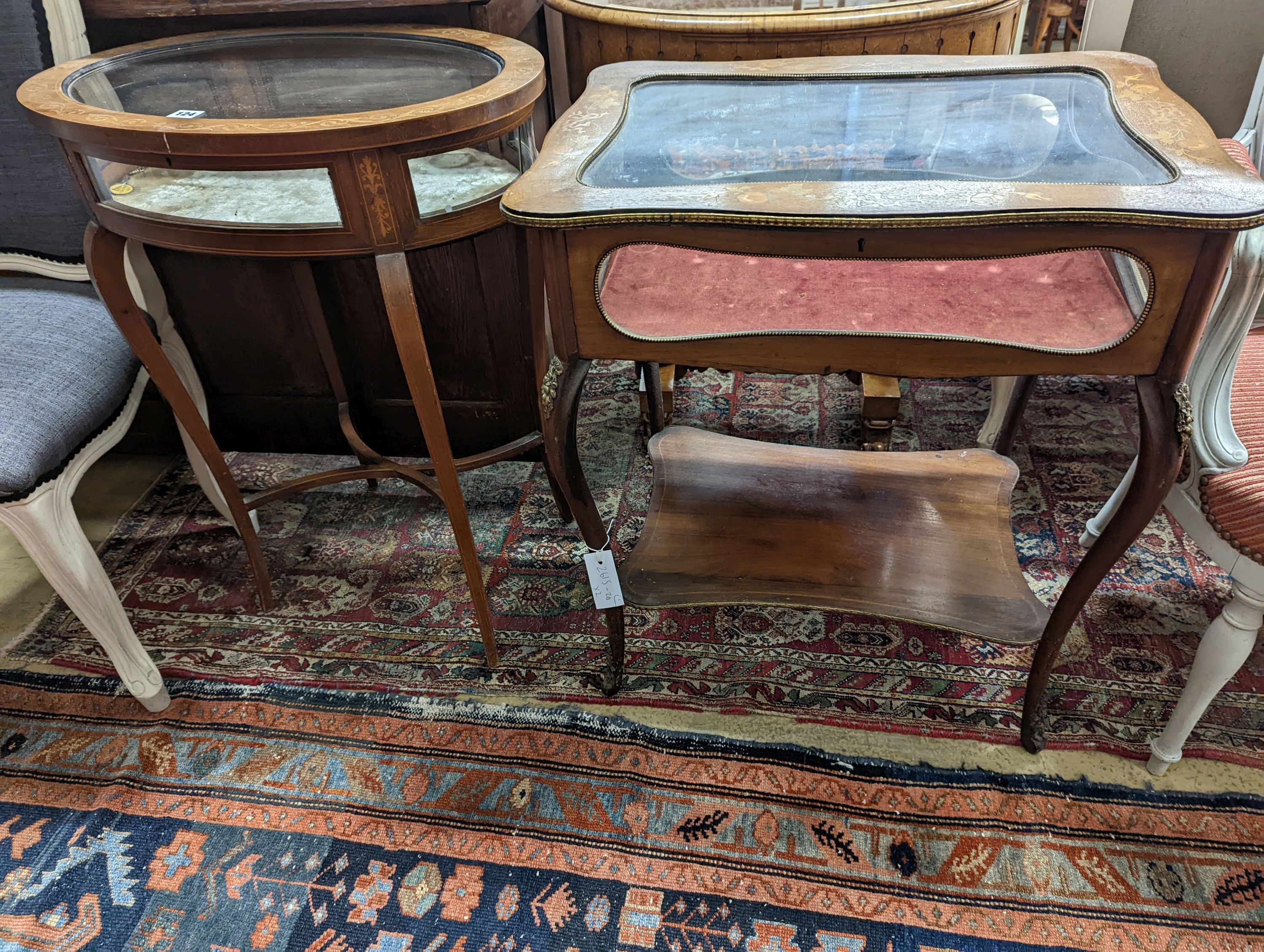 An oval marquetry inlaid mahogany bijouterie table, together with a larger rectangular bijouterie table, larger width 64cm, depth 46cm, height 72cm